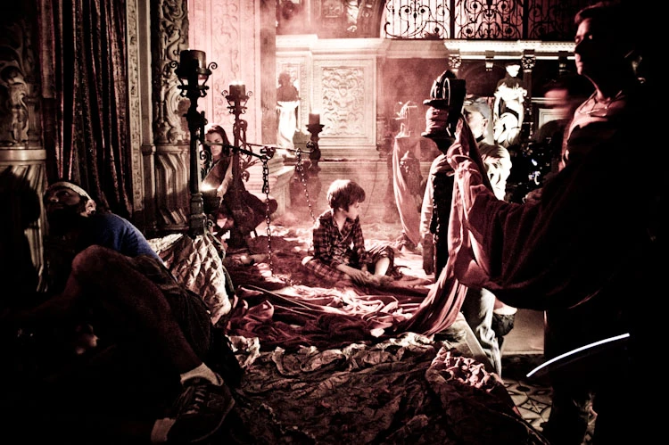 Cast and crew working in the demon’s lair set